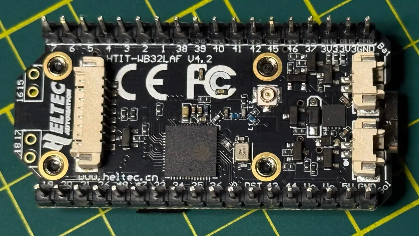 the underside of the board, rotated, showing the heltec logo and the silkscreen reading htit-wb32laf v4.2